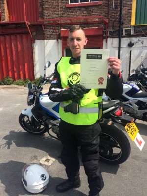 Sam shows off his Inner Circle DAS course completion certificate after passing his bike test - well done!