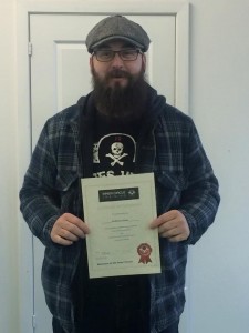 Anthony with his certificate after completing his DAS course and passing his motorcycle test first time