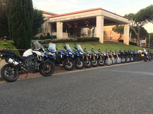 Paul's group of bikes lined up outside the dealers' hotel. 3 of each - Explorer, Speed Triple R, Thruxton R, Bonneville T120, Street Twin